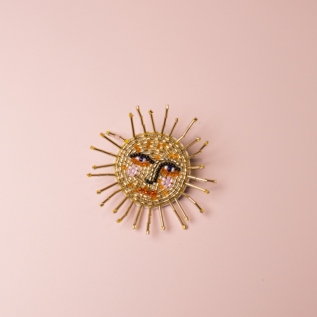 Sun brooch clearance